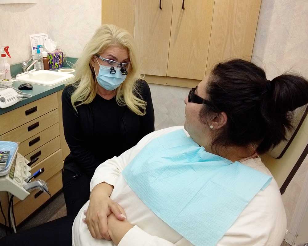 Whittier Palm Dental Dental Consultation 49850 Dentist consulting patient at Whittier Palm Dental in Montebello, CA